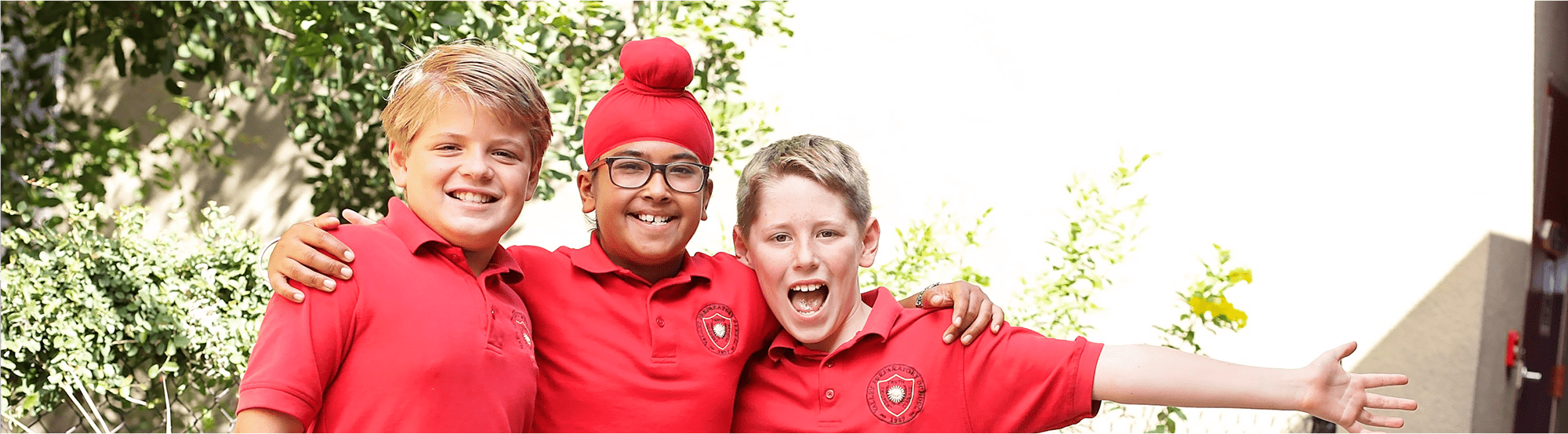 Students pose together outside